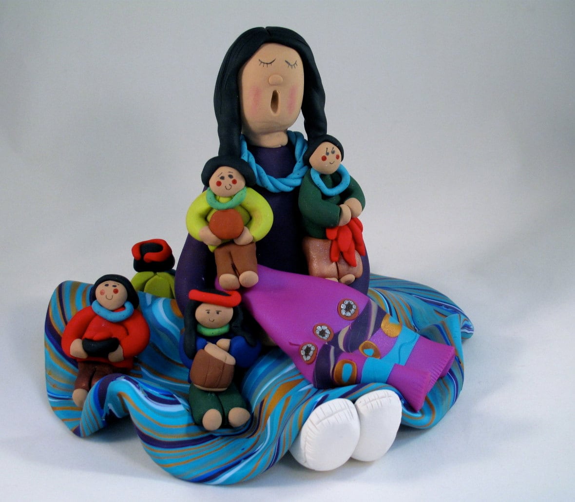 american indian storyteller figurines