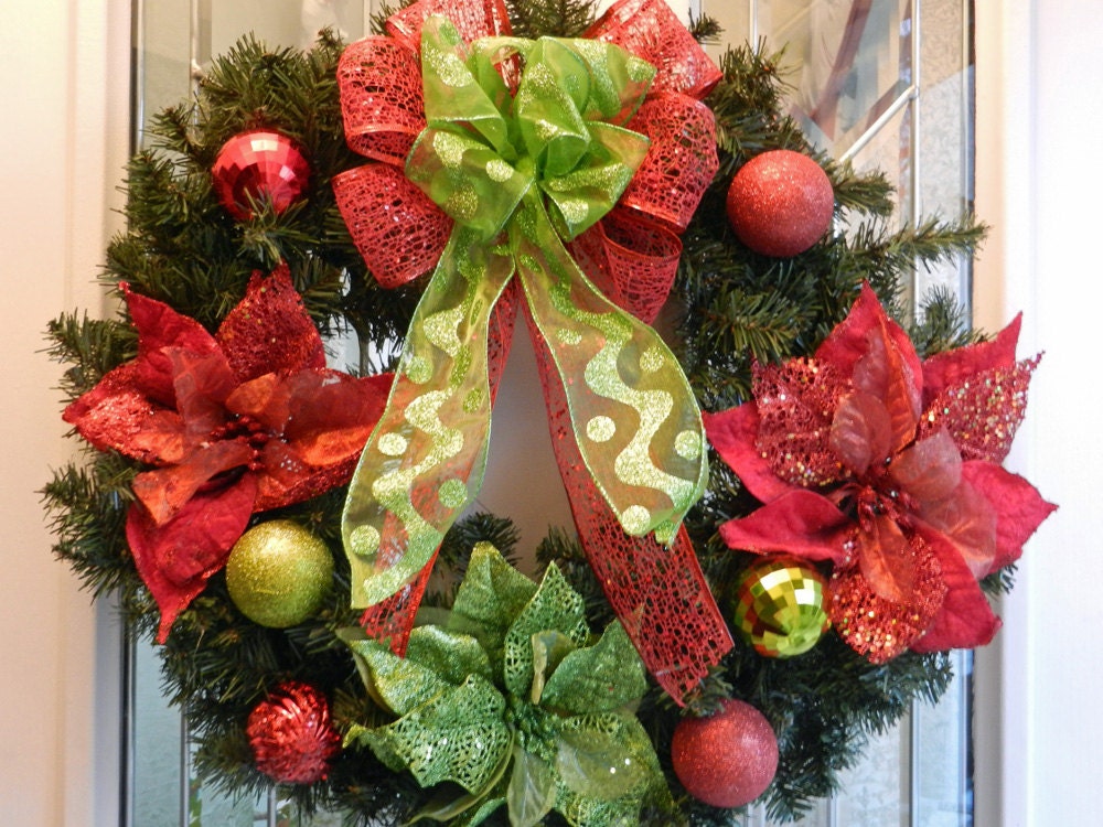 Christmas wreath red and lime green ornaments, poinsettia and bow