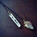 REVERIE Ra Crystal Quartz Point and Arrowhead dipped in 24kt Gold Lariat