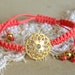 Friendship bracelet gold lace and orange braided