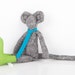 Plush ooak City mouse in black and white woven pure silk wears green socks and Neon Turquoise tie handmade fabric doll