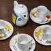 Doctor Who Tea Set - White, hand-painted with four Companion cups and saucers - Quotes from Nine, Ten, Eleven, Rose, Martha, Donna, and Amy