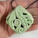 Hand carved mint green porcelain pendant necklace