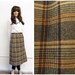 plaidical. vintage 60s Pendleton plaid skirt. autumn colors. size medium/large
