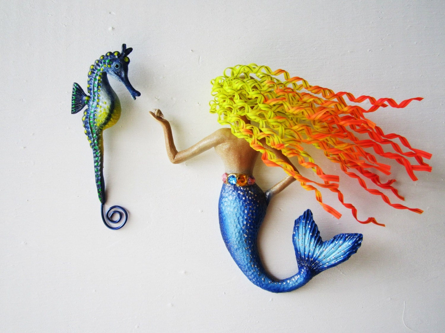 Mermaid art with seahorse wall sculpture