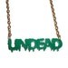 Undead Necklace SALE was 11.99 now 7.99, Dark Green Laser Cut Pendant Gold Chain