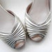 Clearance .....Pretty gold ruched shoes size 8