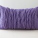 Purple knitted pillow