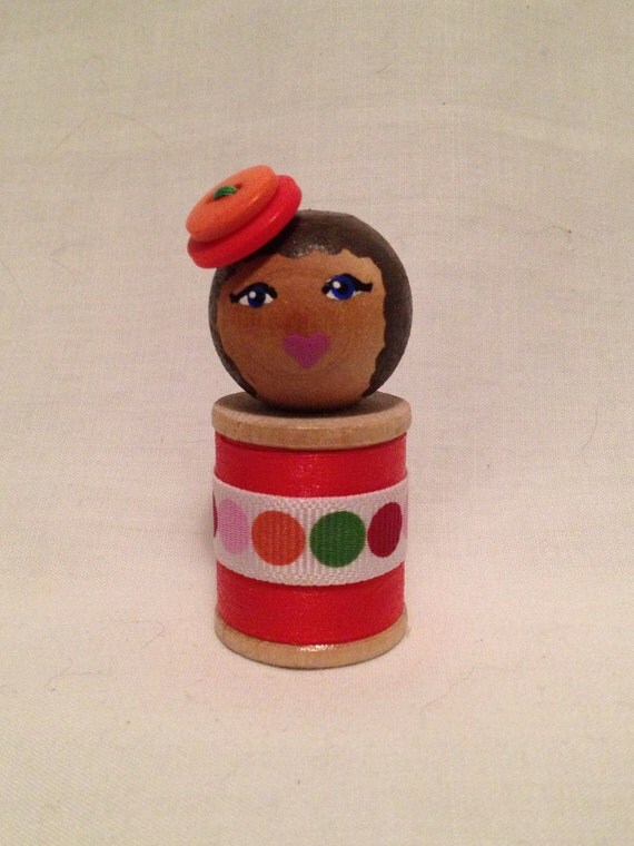 wooden spool doll