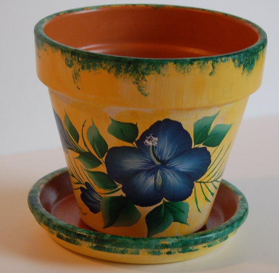 6 or 8 Hand Painted clay flower  pot 