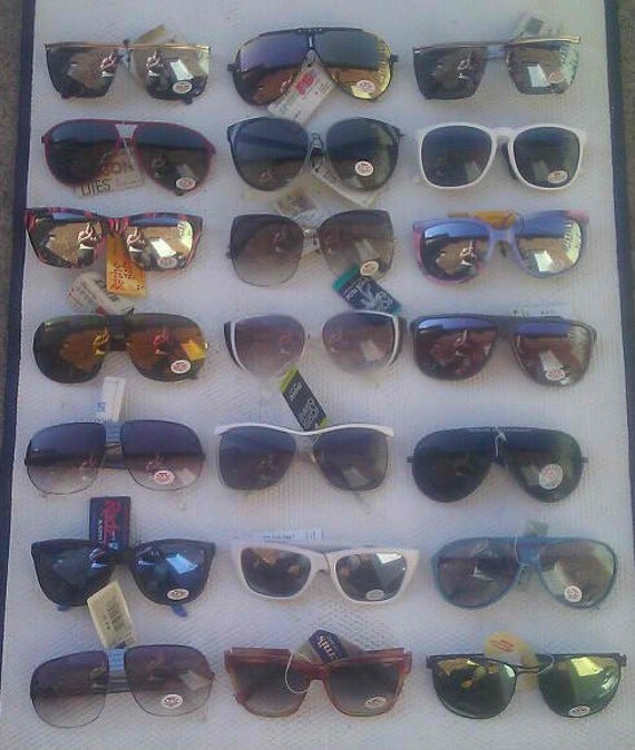 21 Vintage name brand sunglasses 70s and 80s era all in new
