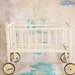 antique doll crib with wheels