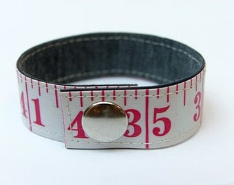 Measuring tape bracelet - White w/ red print (upcycled vinyl)