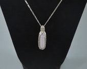 Glistening Pink Glass and Silver Pendant