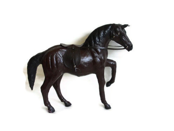 antique leather horse figurine