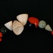 short asymmetrical necklace with natural seeds and nuts