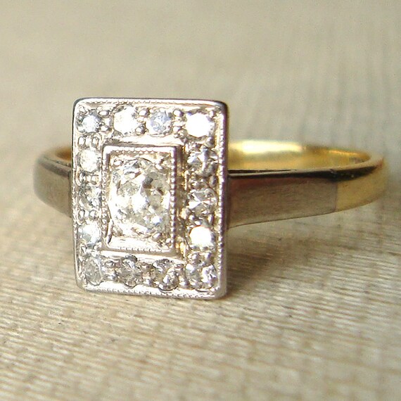 solitaire rectangle diamond ring