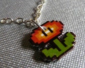 pseuderanthemum incendia - super mario 3 fire flower necklace
