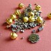 Bali Style Gold and Silver Bead and Spacer Mix - daisy spacers, faceted rounds, ornate tubes, etc.