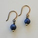 Paz Earrings - Faceted Periwinkle Blue Jade or Pyrite and Antique Brass