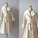 r e s e r v e d...1970s faux fur coat / belted coat / Where the Snows Are