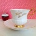 Vintage Happy Birthday Teacup and Saucer. White. Gold Accent. Alice in Wonderland. Dainty. Serving. Home Decor. Gift. 1970s. KHL Fine China.