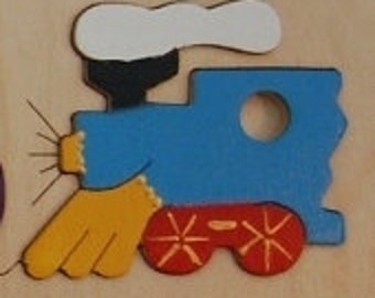 Wooden Name puzzle with choo-choo train piece - a cute birth gift, first birthday gift, or holiday gift for train loving boys or girls.