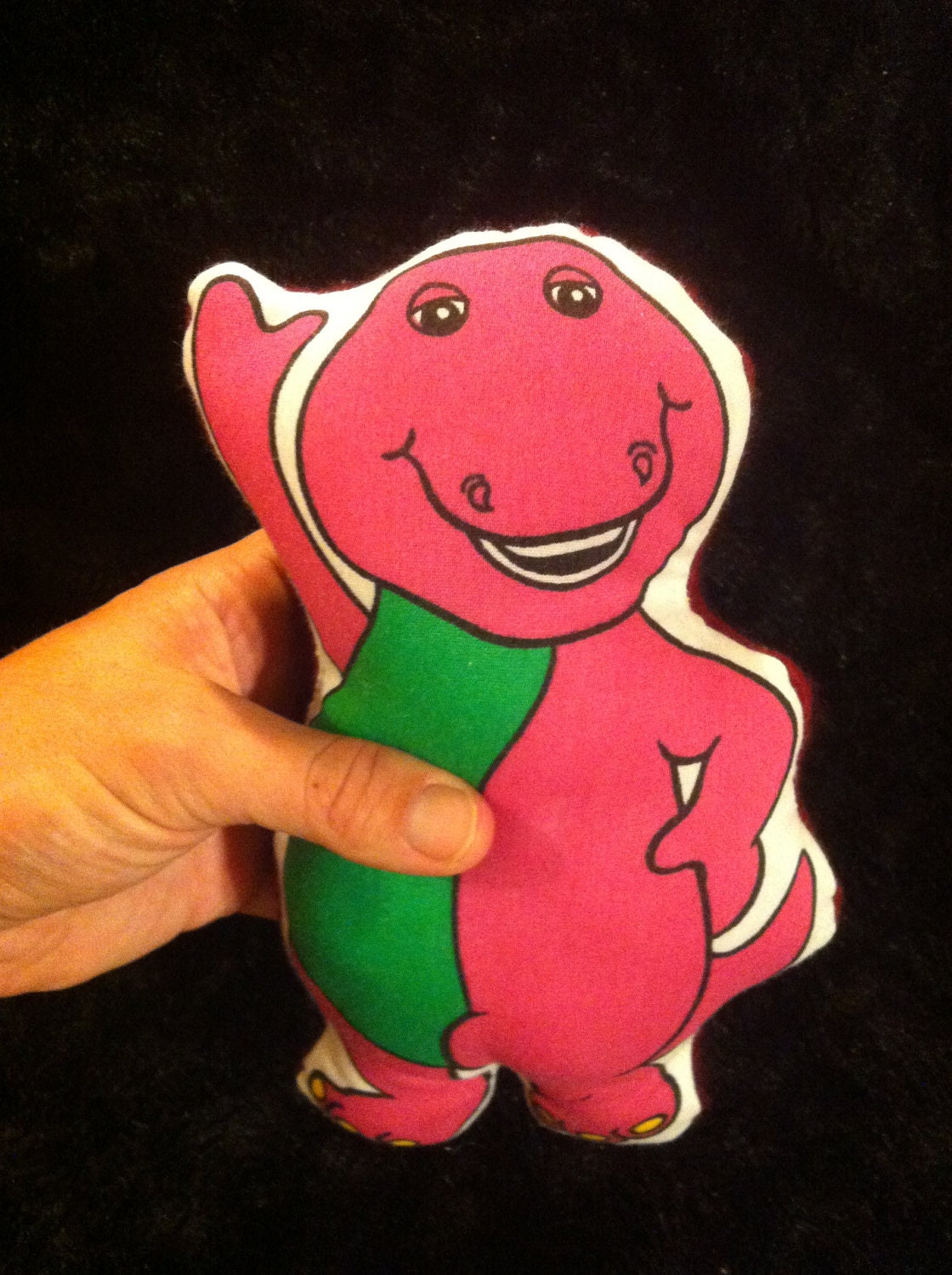 stuffed purple dinosaur