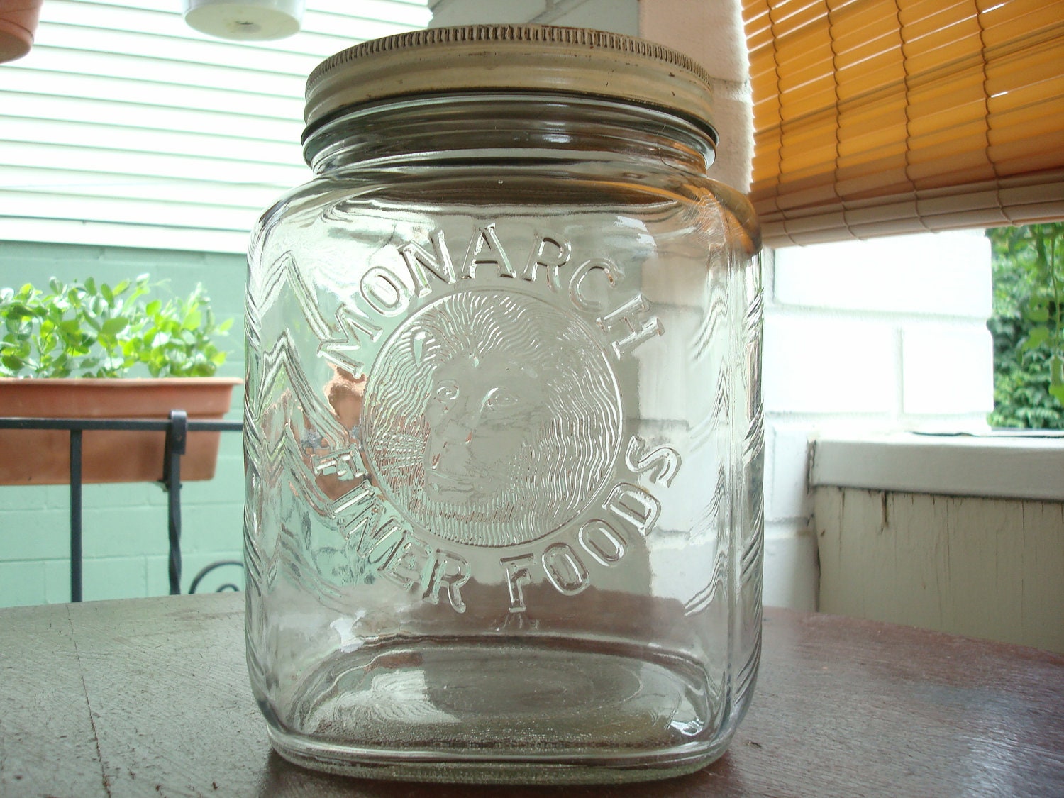 Vintage Monarch Finer Foods Jar with Embossed Lion Face Head