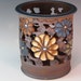 Luminaire Vase With Flowers, Cutouts, And Swirl Design With Texturing