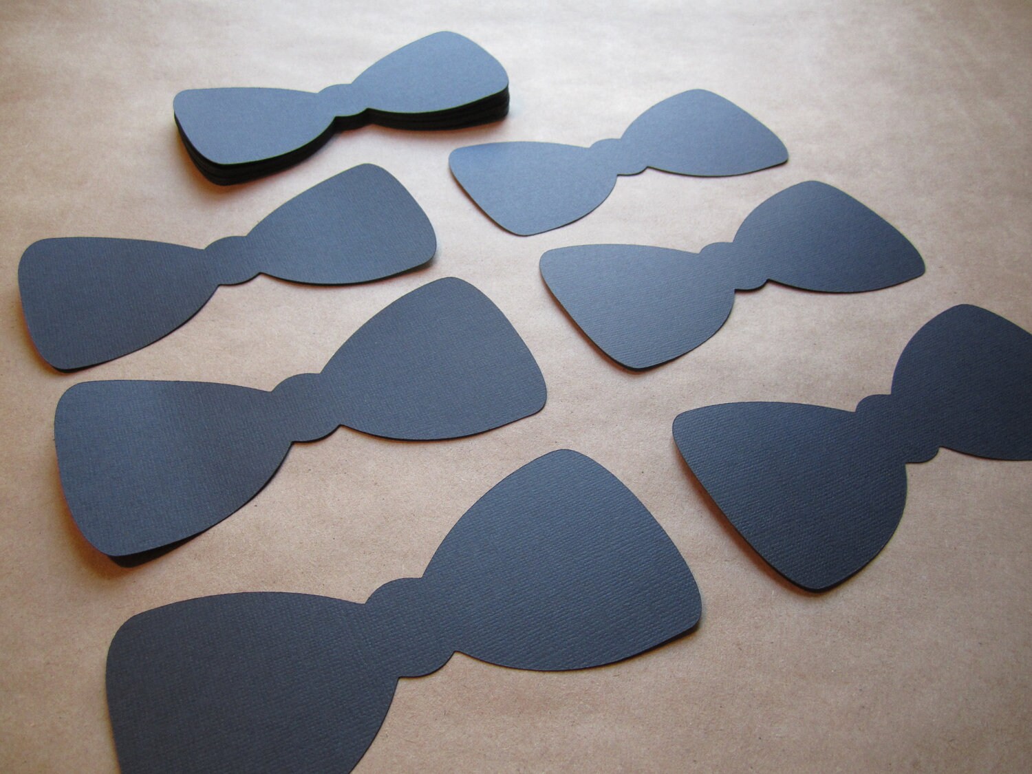 50 paper bow tie cut outs