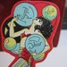 Fantastic 1920's art deco die cut New Years Celebration place card with scantily clad flapper in a pin up pose holding bubbles rust craft