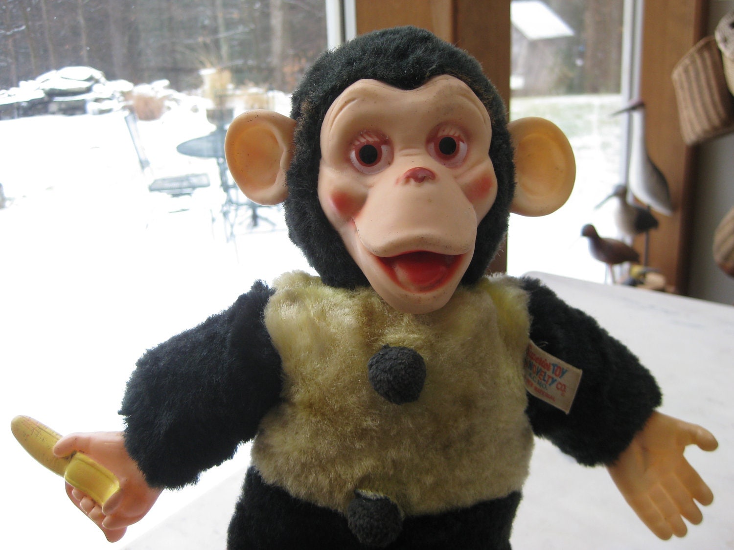 monkey holding banana stuffed animal