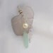 Sea Glass Jewelry here. Wire wrapped large piece of sea glass w pearl & crystals as a pendant. FREE SHIPPPING