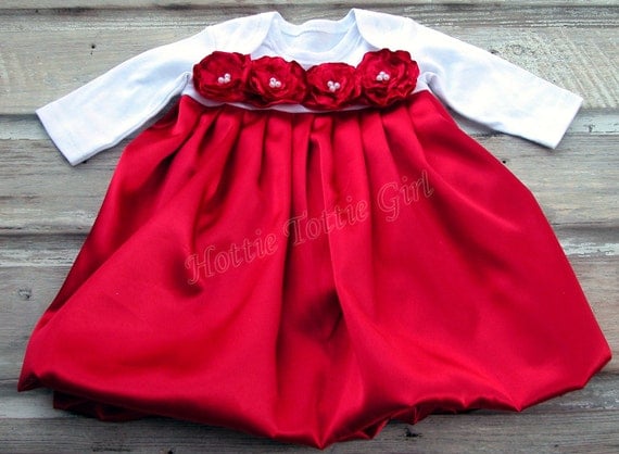 red newborn gown
