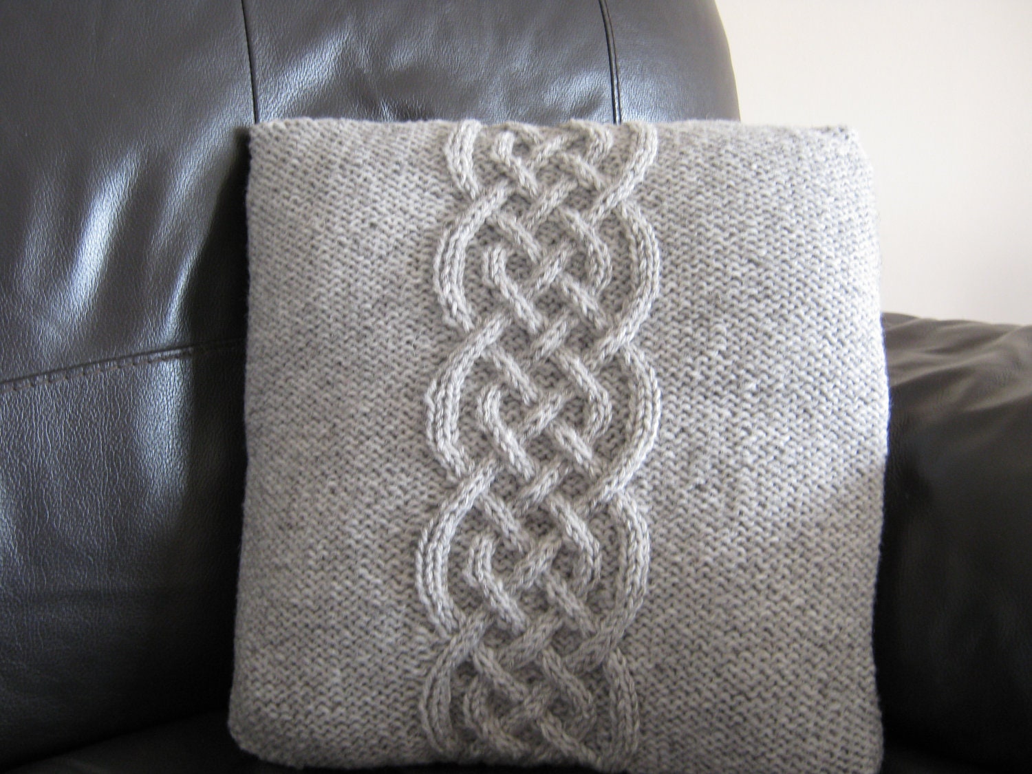 Hand knitted cushion cover