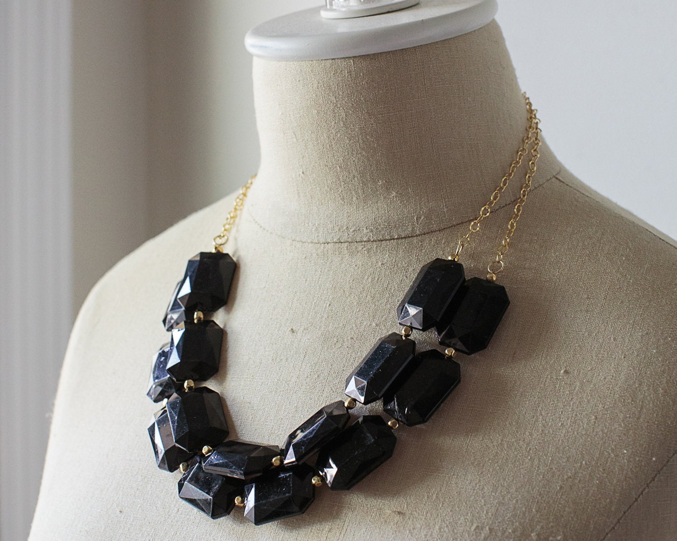 Black and gold bib statement necklace