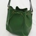 Vintage Louis Vuitton epi bucket in green. Stunning color as an accent.