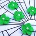 Small green royal icing flowers with edible pearl center -- Edible cake decorations cupcake toppers (50 pieces)