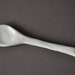 spoon in earthenware