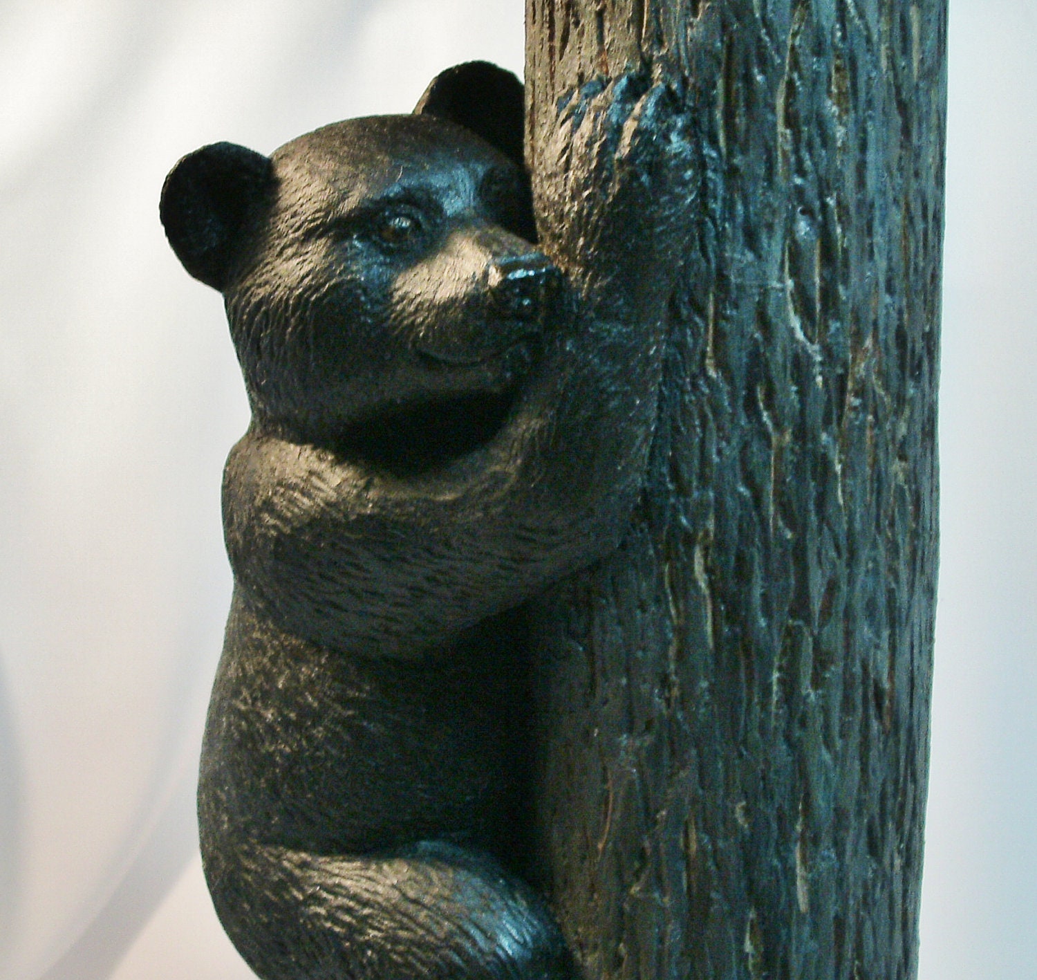 Black Bear Cub Climbing a Tree Wood Carving by OsbornArtistry