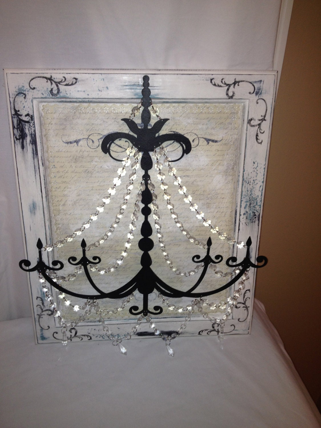 Metal Chandelier Wall Art in White Black and a little Blue