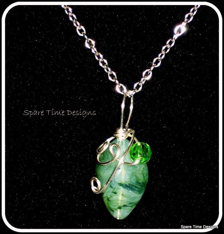 Green swarovski element necklace by SpareTimeDesignsMI on Etsy