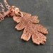 18 inch Necklace with Bright Copper Dipped Oak Leaf Pendant