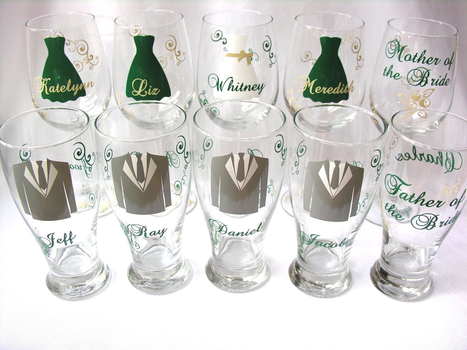 Wedding party glasses wine glasses and beer pilsner glasses.