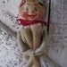 Vintage Knee Hugger Elf, Pixie fairy, Christmas Ornament decoration felt cream suit with red collar and matching hat with bell, large elf