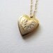 Beautiful gold vintage heart locket on delicate 14k gold plated chain