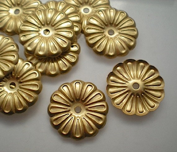 12 brass mirror rosettes No. 9