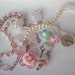 Spring Fling pastels and a toadstool vintage recycle flowers and buttons one of a kind necklace