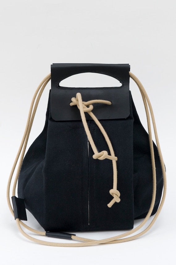 Items similar to Canvas popup bag with black leather handles and beige